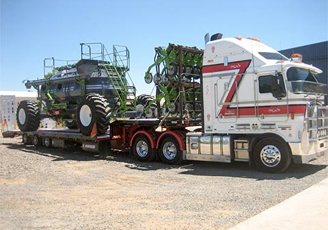 Ag equipment on Low Loader
